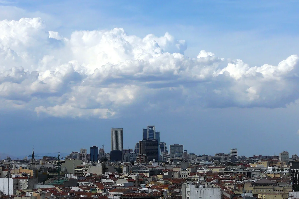Madrid skyline beneath a broad summer sky